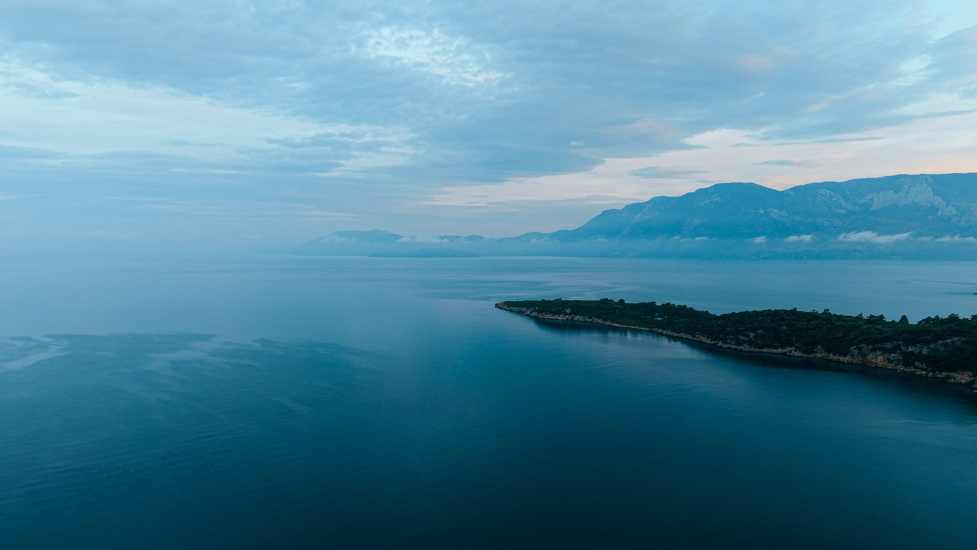 Aerial coastline at dawn